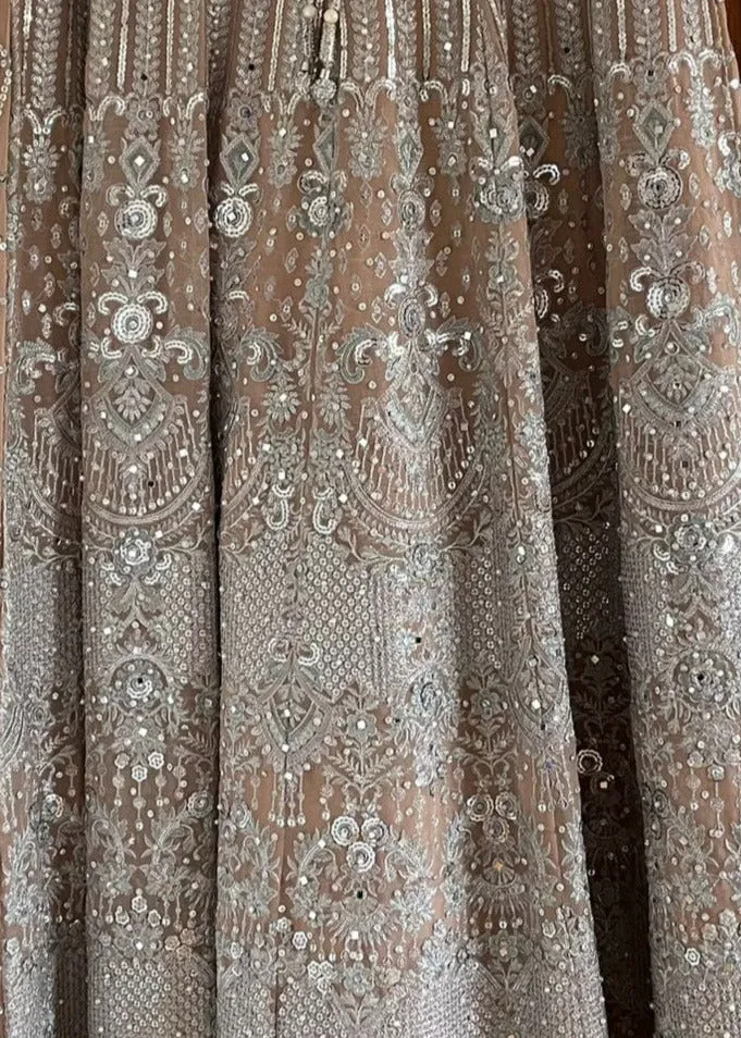 Long Heavy Anarkali Maxi outfit with matching potli bag