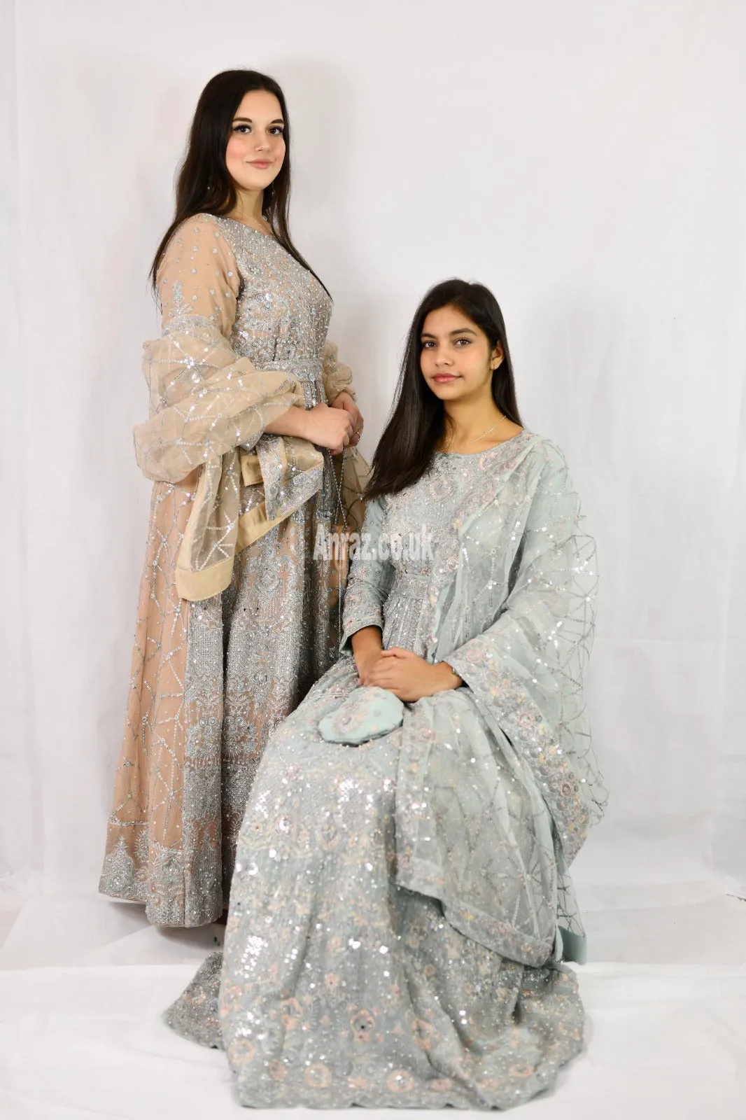 Long Heavy Anarkali Maxi outfit with matching potli bag